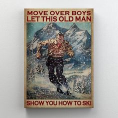 a poster on the wall shows a man skiing down a hill with mountains in the background