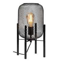 a black metal lamp with two candles on it's side and a wire cage around the base