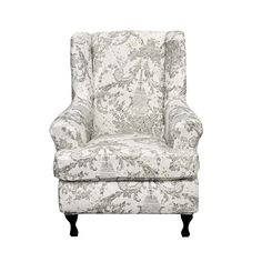 an upholstered chair with a floral pattern on the back and arms, against a white background