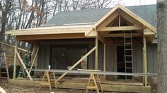 a house being built in the woods