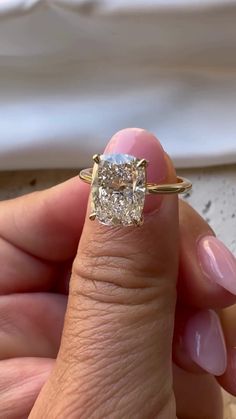 Cushion Cut Moissanite Engagement Ring, Bridal Engagement Ring, Cushion Cut Solitaire, Solid Gold Cushion Cut, Solitaire Proposal Ring ✦Purpouse of Ring ✦ → Engagements 💍 💑 🎉 → Weddings ️𓍢ִ໋🌷͙֒ → Anniversaries  → Fashion accessories ✮.𖥔 ݁ ˖˚୨୧ → Religious significance † 🌷͙֒ 🕊️💍 → Cultural significance  → Achievements gifts 🎖️ → Symbolic gestures of love or commitment ᥫ᭡   Certainly, you can request a certificate for Moissanite and Lab Grown Diamond, which verifies its authenticity and quality, similar to diamond certificates. The stones in jewelry are 100% hand-crafted it is cut and polished by our experienced craftsman.  Moissanite/Lab Grown Diamond is the diamond's best alternative.   ✦ Please allow us 1-2 weeks processing time as it is customized only for you.✦  Description of Cushion Cut Gold Engagement Ring, Antique Cushion Engagement Rings, Engagement Ring Cushion Cut, Cushion Cut Moissanite Engagement Ring, Engagement Ring Cushion, Asscher Cut Ring, Moissanite Engagement Ring Cushion Cut, Cushion Cut Solitaire, Engagement Season