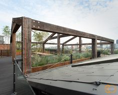 the roof of a building with a wooden structure on it