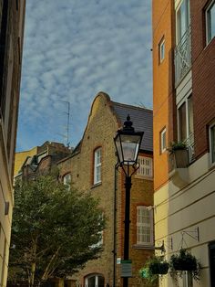 a street light in front of some buildings