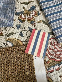 an assortment of different patterns and colors on woven material, such as fabric or cloth