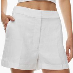 Brand New Summer High-Waisted Shorts From Aritzia Wilfred. Beautiful Design, Comfortable Shorts. It Will Be A Perfect Match To Any Summer Outfit. Shorts Have Deep Pockets At The Front. Back Pockets Are Fake. Size: 6 Color: White Material: 66% - Tencel, 34% - Linen Measurements: Length: 15.7 Inches (40cm) Inseam: 11 Inches (28cm) Waist Width: 14.5 Inches (37cm) Shipping Details: 1-2 Business Days Chic Linen High-waisted Shorts, Fitted Bermuda Bottoms For Summer, Elegant High-waisted Shorts With Pockets, Elegant High-waisted Shorts For Summer, Elegant Short Linen Bottoms, Elegant Short Pants For Summer, Elegant Short Summer Pants, White Short Leg Bottoms For Workwear, Chic Bermuda Summer Pants