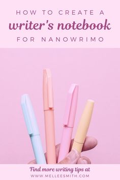 a hand holding four pens with the words how to create a writer's notebook for nanowrimo