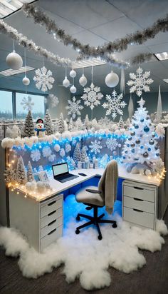 an office decorated for christmas with snowflakes and decorations on the walls, desks and chairs