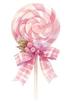 a pink and white lollipop on a stick