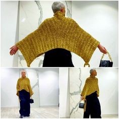 an older man wearing a gold knitted shawl and holding a handbag in front of him