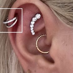 two different types of ear piercings on top of each other