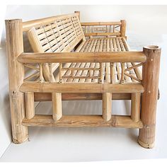 two wooden benches sitting next to each other on top of a white floor covered in wood