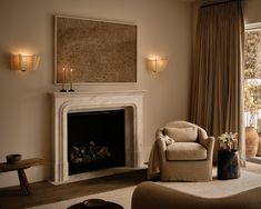 a living room filled with furniture and a fire place in front of a window next to a fireplace