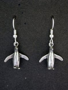 These solid 3 Dimensional Penguin earrings are Sterling Silver.  This Penguin earring measures  5/8" tall by 11/16" across. I hand cast all my pieces using the lost wax casting method. Please ask your needs. You may call me with questions, often I am out so please use my machine. 831-476-3176. Satisfaction Guaranteed!I send items USPS First Class unless otherwise directed. I send as soon as I can, usually in one to five days. I do shows and am out of the shop quite a bit. When I list an item, it Adjustable Hand Cast Earrings As Gift, Penguin Earrings, Penguin Jewelry, Jellyfish Pendant, Celtic Knot Earrings, Flamingo Earrings, Tahitian Black Pearls, Diamond Eyes, Silver Eagles