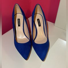 Nine West Heels Color: Royal Blue Size: 7.5 Also Available In Size 7 Additional Details: Heel Height 3 Inches Brand New With Tags Office, Holiday, Business Blue High Heel Court Shoes With Padded Heel, Chic Blue Court Shoes With Round Toe, Blue Wedge Heels For Evening, Blue Closed Toe Court Shoes With Padded Heel, Blue Suede Block Heel Shoes, Blue Pointed Toe Court Shoes With 4-inch Heel, Blue Suede Heels With Block Heel, Blue Padded Heel Court Shoes, Chic Blue Block Heel Court Shoes