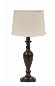 a lamp with a white shade on top of it and a black base is sitting in front of a white background