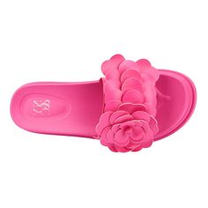 These slides feature a unique appeal with eye-catching flower appliqué that adds a touch of charm to your look. Not only are they visually striking, but they are also designed with comfort in mind, making them perfect for walking. The soft, cushioned sole ensures all-day wearability, while the floral details offer a playful and stylish twist. Whether you're heading to the beach or a casual outing, these slides blend fashion and function effortlessly. Chic Pink Slip-on Slides, Spring Pink Eva Sandals, Pink Eva Sandals For Spring, Chic Pink Flip Flops For Summer, Trendy Spring Slide Flip Flops, Pink Eva Slip-on Flip Flops, Pink Eva Open Toe Flip Flops, Pink Flower Sandals For Spring, Chic Pink Flat Slides