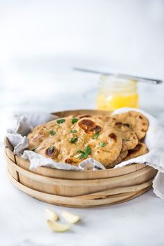 some food is sitting in a basket on the table