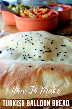 A Turkish balloon bread or puffed lavash bread topped with nigella seeds. Dips and salads are in the background. Turkish Puff Bread, Lava Bread Recipe, Puffy Bread Recipe, Turkish Lavash Bread Recipe, Iranian Bread Recipe, Balloon Bread, Turkish Bread Recipe, Lavash Bread Recipe, Fatayer Recipe