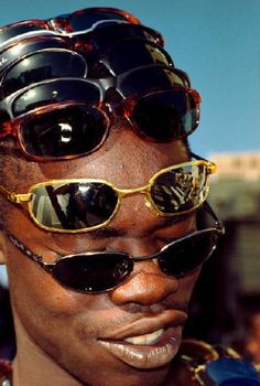 a woman with sunglasses on her head and some hair