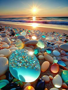 the sun shines brightly on some rocks at the beach