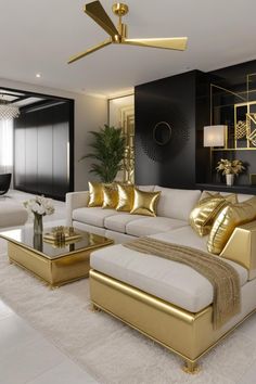 a living room filled with white couches and gold pillows