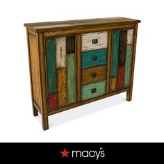 an old wooden cabinet with multicolored drawers