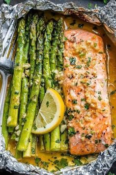 salmon and asparagus foil packs with garlic lemon butter sauce