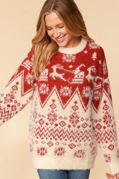 a woman wearing a red and white christmas sweater