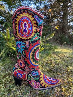 "Tall Embroidered Cowgirl Boots Silk Petit Point with leather interior. These one of a kind hand made boots are created from hand drawn designs on cotton canvas, inspired by original designs from ancient Uzbekistan textile history.  Height measures 15.5\" on the side with a 2 1/2\" heel and calf measures 15\". Size 39 (US9) available. 100% silk petit point with leather interior. Black colored leather stacked heel with leather sole.  Handmade in Uzbekistan. Your purchase preserves and encourages Traditional Fitted Boots For Fall, Winter Festival Embroidered Boots, Embroidered Winter Festival Boots, Multicolor Western Festival Boots, Multicolor Western Boots For Festivals, Traditional Fitted Boots With Round Toe, Bohemian Multicolor Boots For Festivals, Multicolor Embroidered Boots, Multicolor Bohemian Boots For Festivals