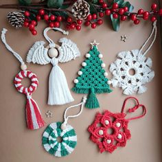 crocheted christmas ornaments are displayed on a table