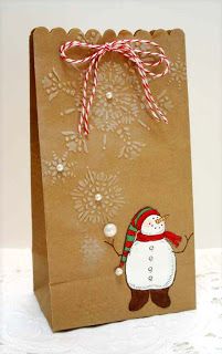 a brown paper bag with a snowman on it