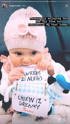 a baby is holding a sign that says we are going to be okay today and it's ok