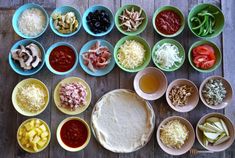 several bowls with different types of food in them on a table top next to each other