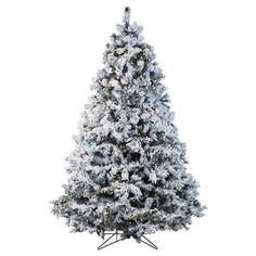 a white christmas tree with snow on it