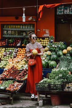 With this in mind, I've been exploring Istanbul in the coziest red maxi dress ever. Paired it with a striped tee underneath ... White Tshirt Outfit, Skirts With Sneakers, A T, Fruit Stand, Tshirt Outfit, Trendy Skirts, Red Maxi, Pleated Maxi Skirt, Paris Outfits