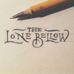 a pencil is laying on top of a piece of paper with the words, the lone below