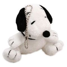 a stuffed dog with a chain around its neck