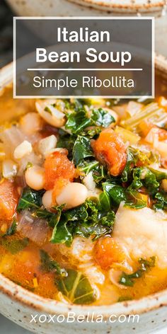 italian bean soup with spinach and carrots in a white bowl