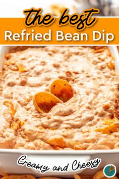 A warm, creamy, and cheesy refried bean dip topped with melted cheddar, served in a white dish, and garnished with tortilla chips. Cheesy Refried Bean Dip, Cream Cheese Refried Bean Dip, Refried Bean Dip With Sour Cream, Warm Bean Dip Recipes, Baked Mexican Cheese Dip, Refried Beans Dip Recipe, Taco Dip With Cream Cheese Refried Beans, Refried Bean Dip With Cream Cheese, Bean Dip Recipes Easy