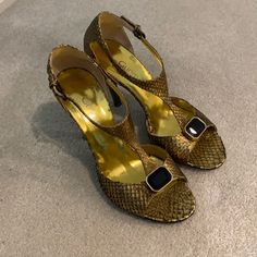 Gunmetal, Made In Italy, Gold Python T-Strap Heels With Black Gem. New Soles Added To Protect Shoes And Add To Wear. Only Been Worn Once! Size 37.5, Fits Like A 37. Gold T-strap Heels For Formal Occasions, Gold Heels With Buckle Closure For Formal Occasions, Formal Gold Heels With Buckle Closure, Gold T-strap Leather Heels, Gold Leather T-strap Heels, Gold T-strap Sandals For Party, Gold T-strap Heels For Party, Elegant Gold Heels With Buckle Closure, Designer T-strap Heels For Party