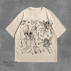 1x Beautiful Fairy 90s T-Shirt Our shirts come in unisex sizing and are produced from the finest quality materials, making them incredibly soft and cozy! The high-quality print on our T-shirt features beautiful colors and detailing, ensuring the design stands out beautifully against the fabric. The print is durable, resistant to fading, and offers a long-lasting, premium look and feel. Size - True to size (Comfort fit) - Sizes from small to 5XL - For an oversized fit, size up 1-2 sizes from your Adult Fairy Shirt, Fairy Grunge Crew Neck T-shirt With Graphic Print, Fairy Grunge Cotton Tops With Letter Print, Fairy Grunge Cotton T-shirt With Graphic Print, Fairy Grunge Short Sleeve Tops For Streetwear, Fairy Grunge Graphic T-shirt For Summer, Fairy Grunge Graphic Print Tops For Streetwear, Summer Fairy Grunge T-shirt With Crew Neck, Summer Fairycore Top With Graphic Print