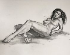 a pencil drawing of a naked woman laying on the ground