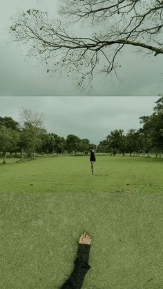 a person standing in the middle of a field with their feet up on the ground