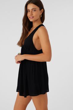 Cute and flowy cover-up dress to elevate your beach look. It features a solid color wash and deep v-neckline. O'Neill Women's woven cover-up dress Mini length Lightweight feel Solid color wash 100% Viscose | O'Neill Women's Saltwater Solids Sarah Tunic Swim Cover-Up in Black, Size XS, Viscose Solid V-neck Beach Cover-up Dress, Breezy V-neck Mini Dress For Vacation, Spring V-neck Swim Dress For Beachwear, Beach Season V-neck Sundress Cover-up, Beachy V-neck Mini Dress For Poolside, Chic V-neck Beach Dress For Poolside, Beachy V-neck Mini Dress For Beach, Breezy V-neck Tops For Beach, Flowy Black Summer Cover-up