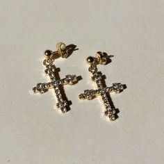 The Vatican CZ Cross Earrings are the perfect combination of elegance & simplicity. Inspired by Old World European style, these earrings make a statement with their religious CZ cross design. Add a touch of sophistication to any outfit with the beautifully crafted Vatican CZ Cross Earrings. Product Details: 30mm Gold-Filled CZ Cross Earrings Butterfly Closure Not Water-Wearable Made in Scottsdale, AZ Elegant Cross Pendant Jewelry For Pierced Ears, Elegant Cross Pendant Earrings, Elegant Pierced Cross Earrings, Old World European, Earrings Butterfly, The Vatican, Gold Gift, Hand Chain, Cross Design