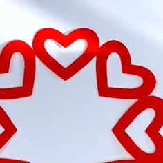 two red hearts shaped like stars against a white background with the shape of a star in the center