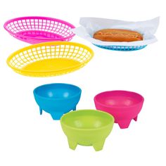 four plastic bowls with hot dogs in them