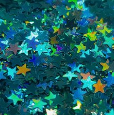 many different colored stars are scattered together