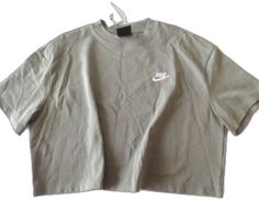 Solid Color Cotton Tops With Graphic Print, Solid Cotton Tops With Graphic Print, Khaki Crew Neck Top For Streetwear, Basic Khaki Short Sleeve Tops, Casual Sports Shirt For Spring, Basic Cotton Sports Top, Spring Sports Cotton Tops, Khaki Cotton Shirt For Streetwear, Nike Cotton Shirt With Relaxed Fit