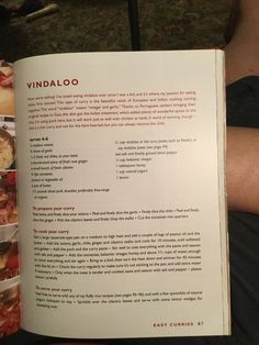 an open cookbook with pictures of various foods on it and the words vindalo written in red